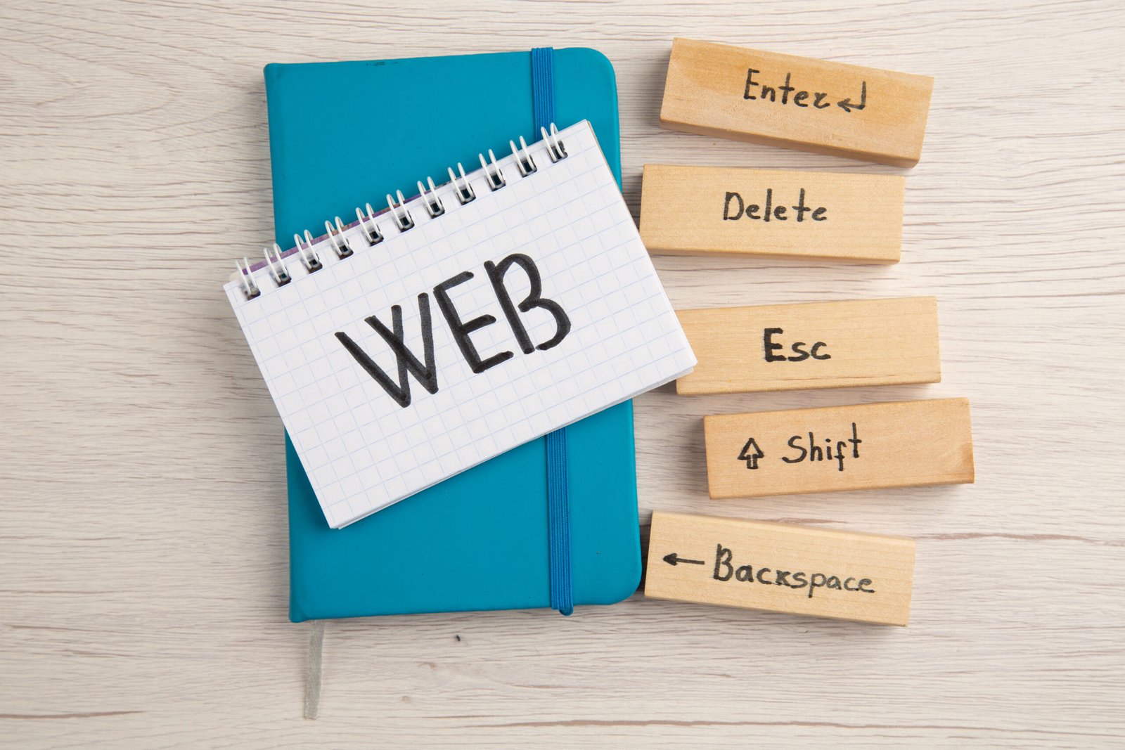 web design concepts with wooden keyword buttons